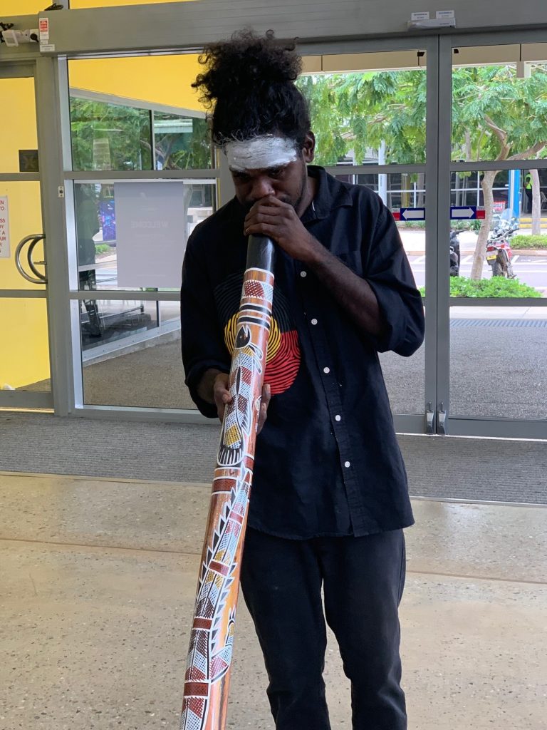 Didgeridoo performance at Palmerston Harmony Day event, showcasing Indigenous Aboriginal culture.