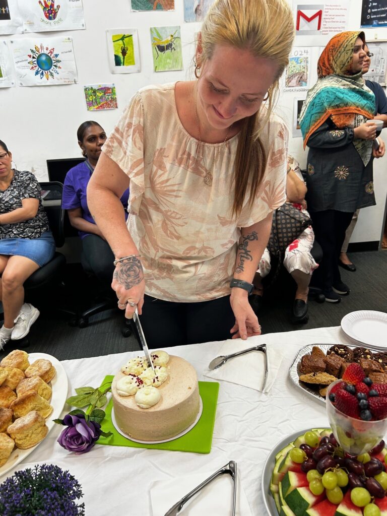 Teegan cutting cake