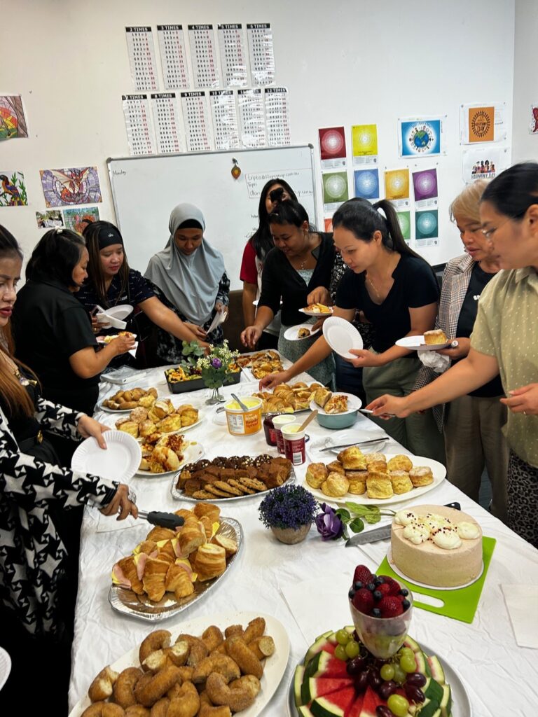 STEPS Skills for Education and Employment students celebrating Teegans achievement with a morning tea.