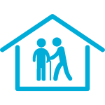 Blue icon of a house with two simplified figures inside, one using a mobility aid and another standing beside them in a supportive posture.