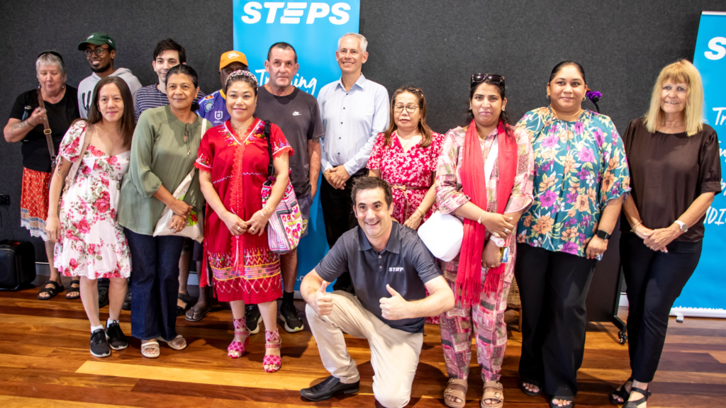 Several STEPS SEE Program participants in Darwin pose for a photo with The Hon Andrew Giles MP, Minister for Skills and Training.