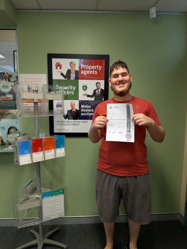 James with his certification in Security