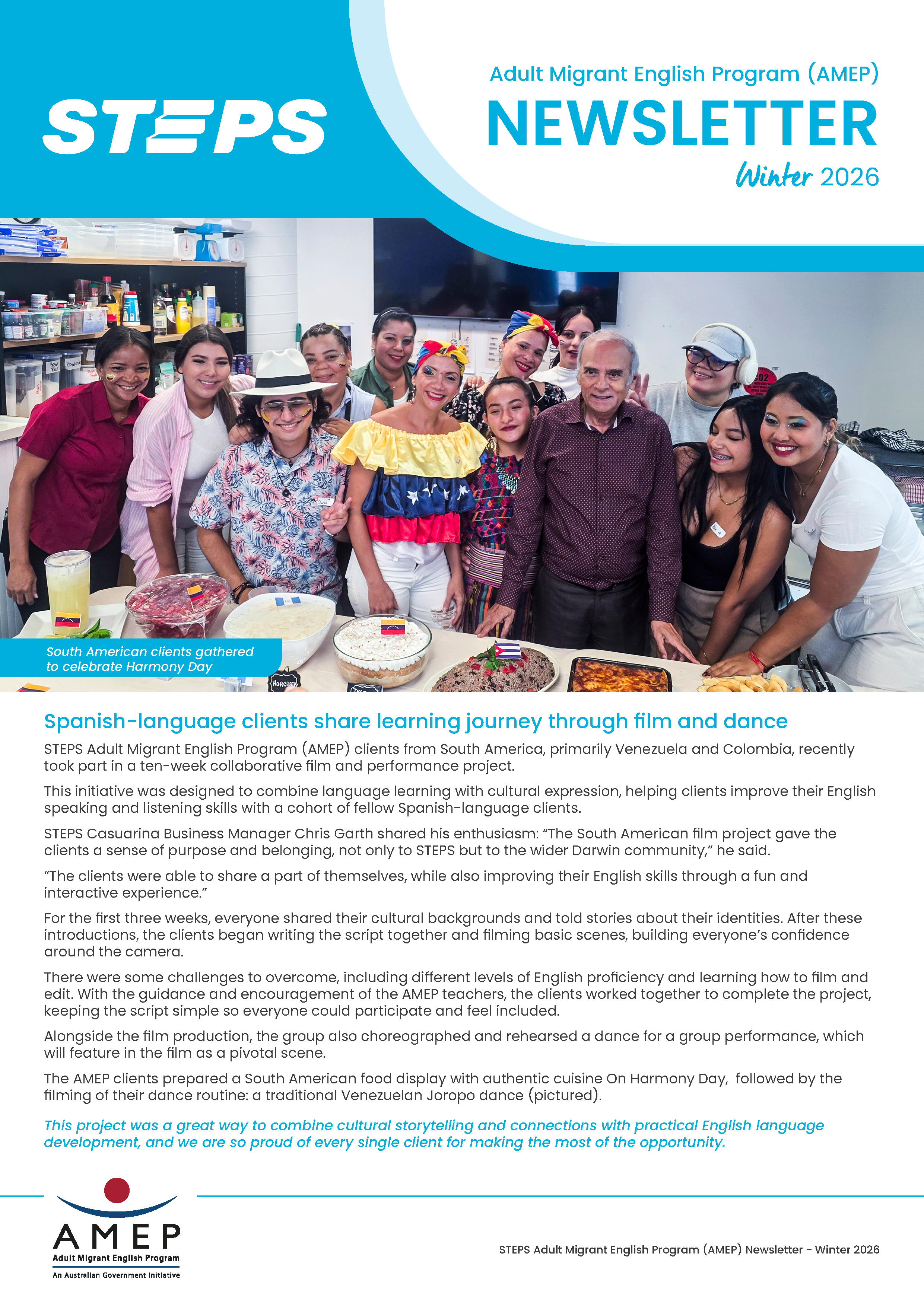 Group of Adult Migrant English Program clients gathered around a table of South American dishes, celebrating Harmony Day in a classroom setting.