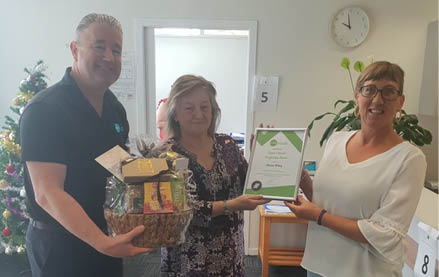 Staff honouring support worker