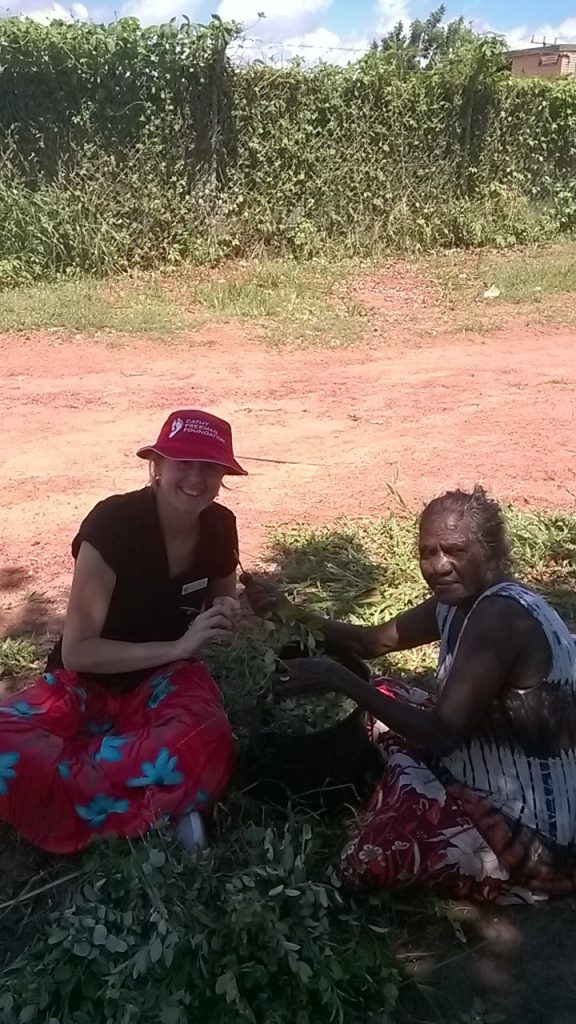 SEE trainer Nicole and student collect leaves in Galiwinku bush